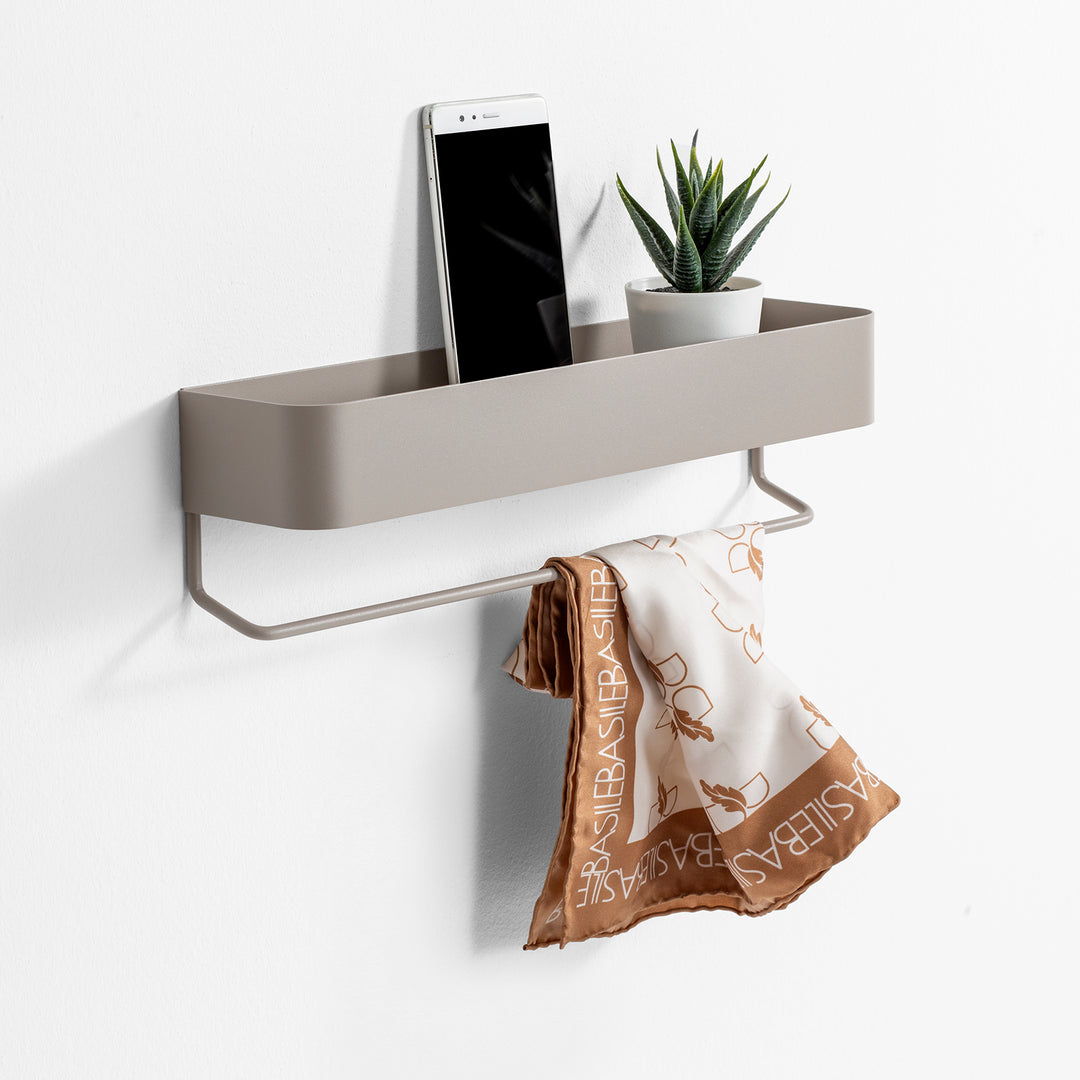 Light gray NINA shelf for objects